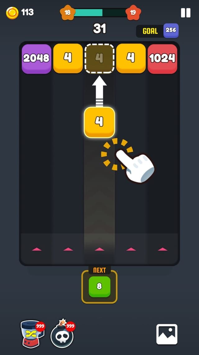A yellow 4 block is fired up the empty lane toward the matching 4 in the row above, with the next block and two boosters waiting below.