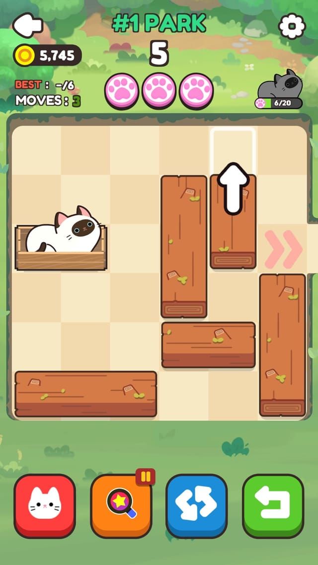 The first park stage, where a white cat sits in a wooden crate and an arrow marks the exit it has to slide toward past the plank blocks.
