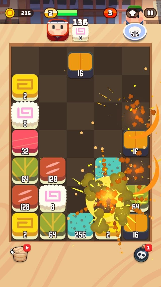 A bomb going off on the right of the board, clearing a group of tiles in a burst of sparks.