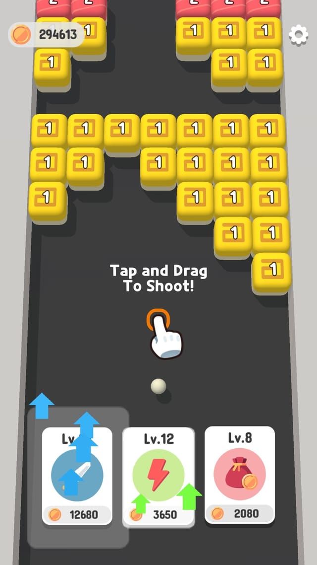 The tap-and-drag instruction shown on an empty lane, with three upgrade cards and their coin prices waiting below.