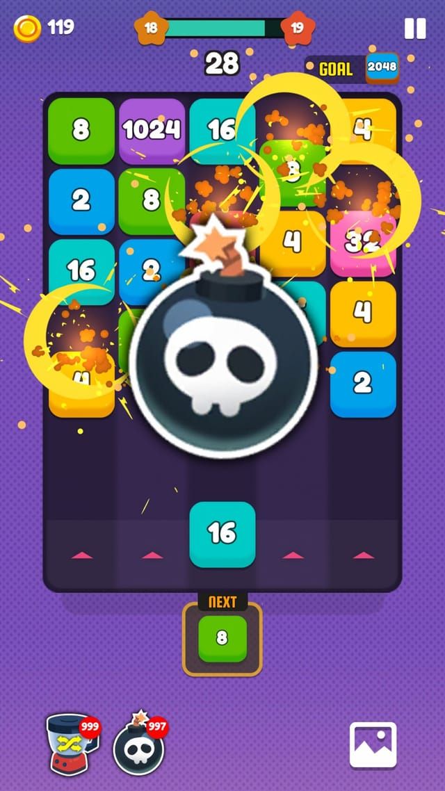 The bomb booster detonating in the middle of the board and blowing away the blocks around it.